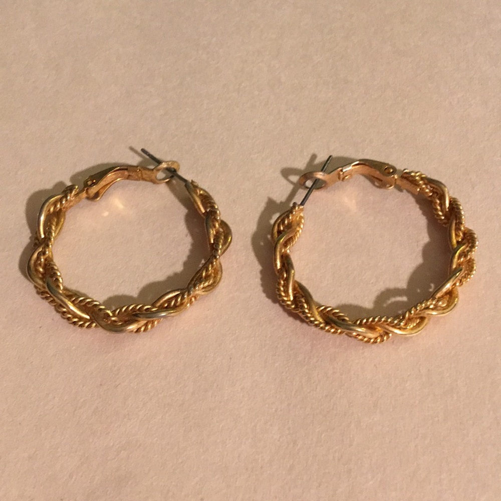 Gold braided earrings.